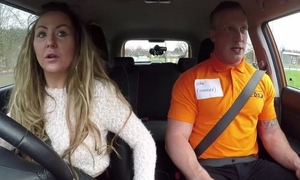 Long-haired MILF blows will not hear of car driving instructor